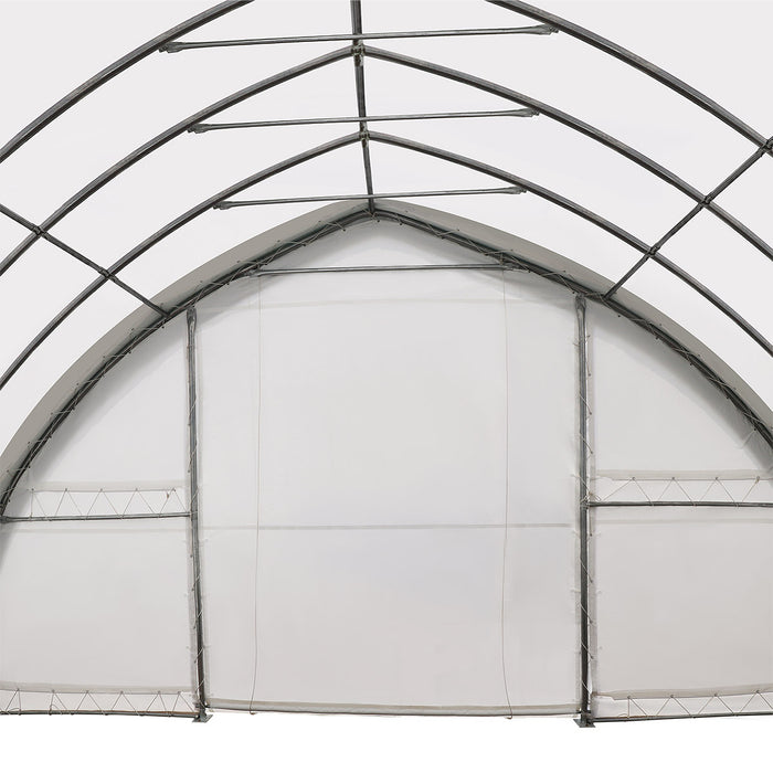 TMG-ST3062V 30x60 peak ceiling storage shelter with heavy duty 17 oz PVC cover, galvanized steel frame, and drive-through roll-up doors for equipment storage