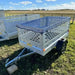 Variant 7’ Heavy Duty Utility Tilt Trailer with Extended Mesh Sides & Net Cover, Removable Tailgate, 4.2’x7’ Tilt Bed, MFR #: S205Tiltmesh, Made in Canada